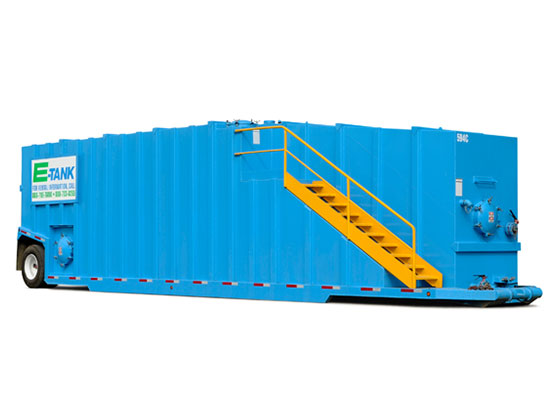 21,000-gallon steel frac tank with stair access for high-volume liquid storage on industrial and construction sites