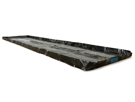 Heavy-duty portable spill containment berm from E-Tank, designed to capture leaks and prevent environmental contamination during tank, pump, and filtration system operations.