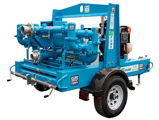 Trailer-mounted industrial pump with secure hose connections, illustrating proper pump safety practices on job sites